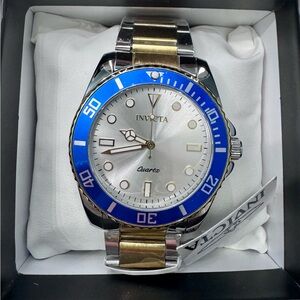 Invicta Silver Dial Watch with Blue Bezel and Two-Tone Band